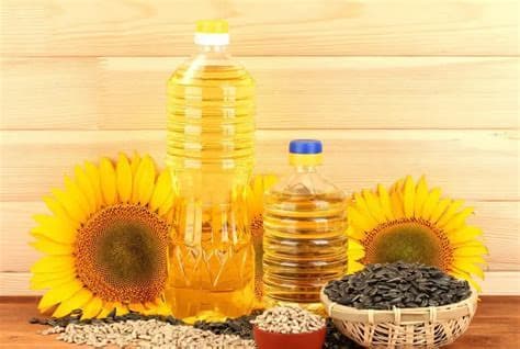 Sunflower oil with fresh sunflowers